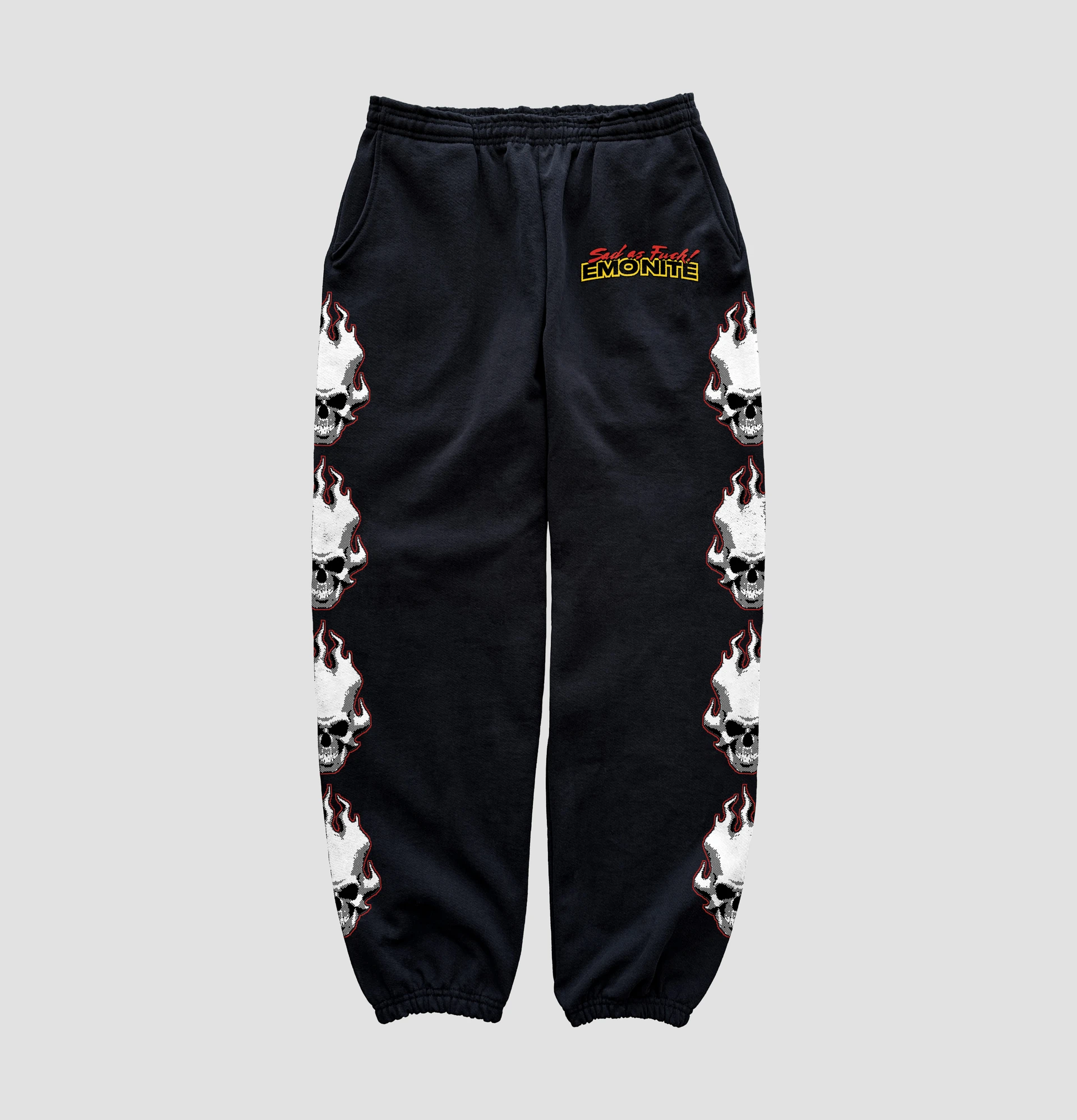 Black Emo Nite pants with red and white flame graphics