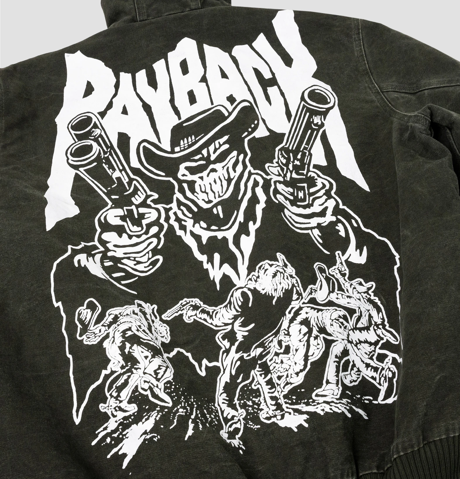 Close-up of the Payback cowboy graphic printed on dark fabric